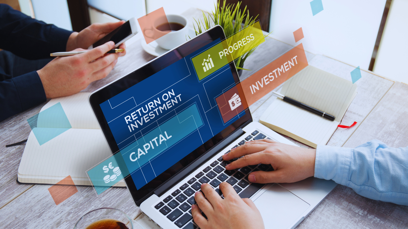 Maximize Your ROI with Expert Home Services Marketing Solutions Close-up of a laptop displaying the text 'Return on Investment', 'Capital', and 'Investment', with digital graphics related to business progress and finance, as two people engage in a business discussion.