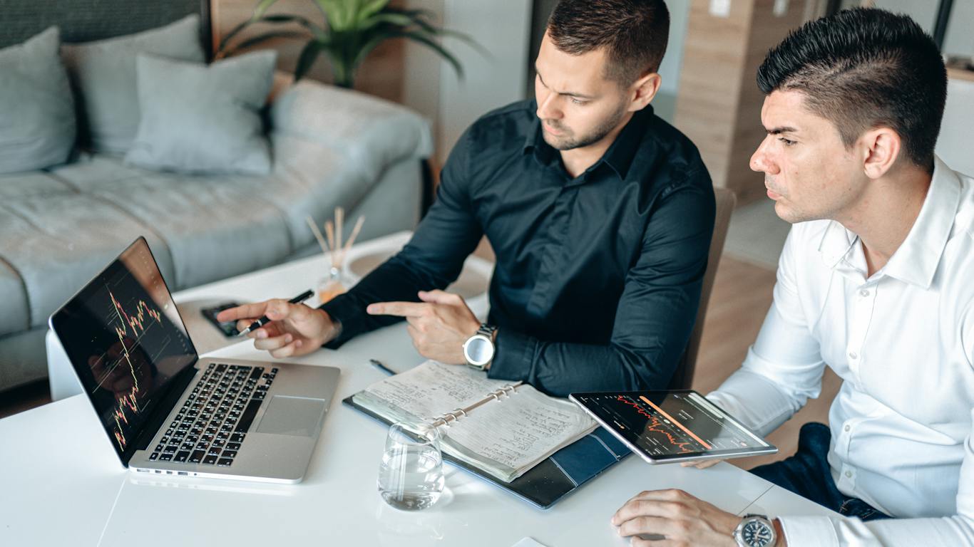 Men-Having-Meeting-with-a-Business-Owner- Men Having Meeting with a Business Owner