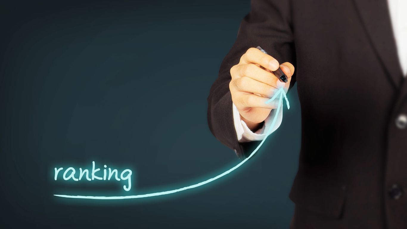 Businessperson drawing an upward arrow labeled "ranking" on a virtual screen, symbolizing improved SEO performance through strong EEAT strategies.